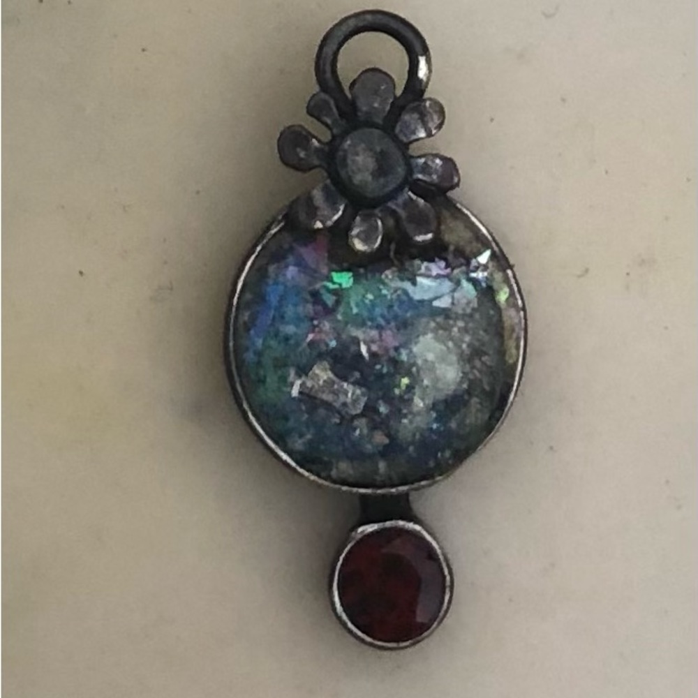 Roman glass charm from Israel, silver